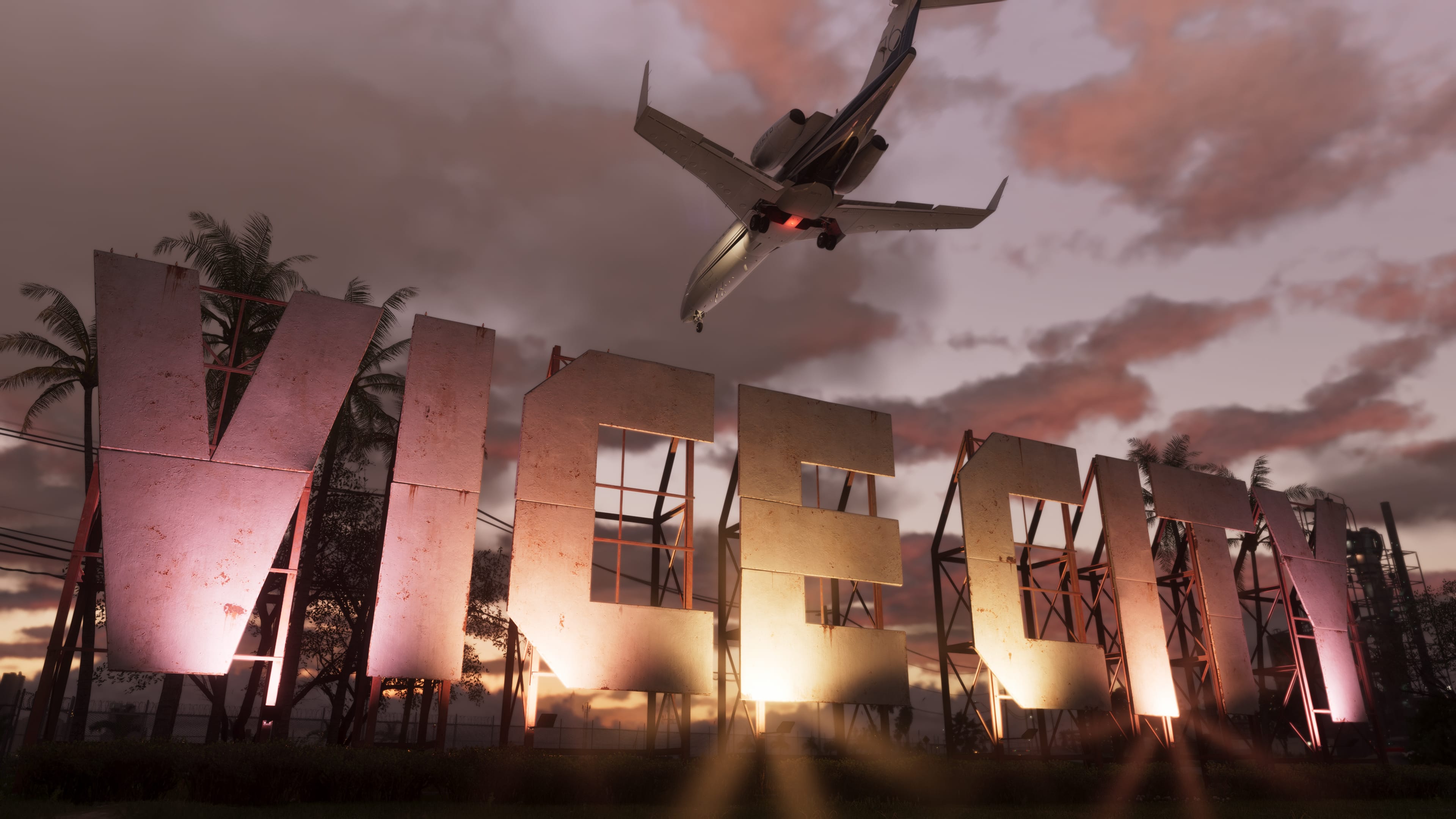 The Vice City sign lit at dusk as a plane passes overhead in GTA 6